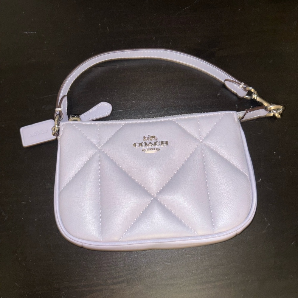 This is the Coach Nolita 15 Puffy Diamond Quiliting handbag.